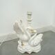 Porcelain lamp swans with vintage gold details