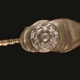 Diamond-point molded glass ewer, silver-plated metal.