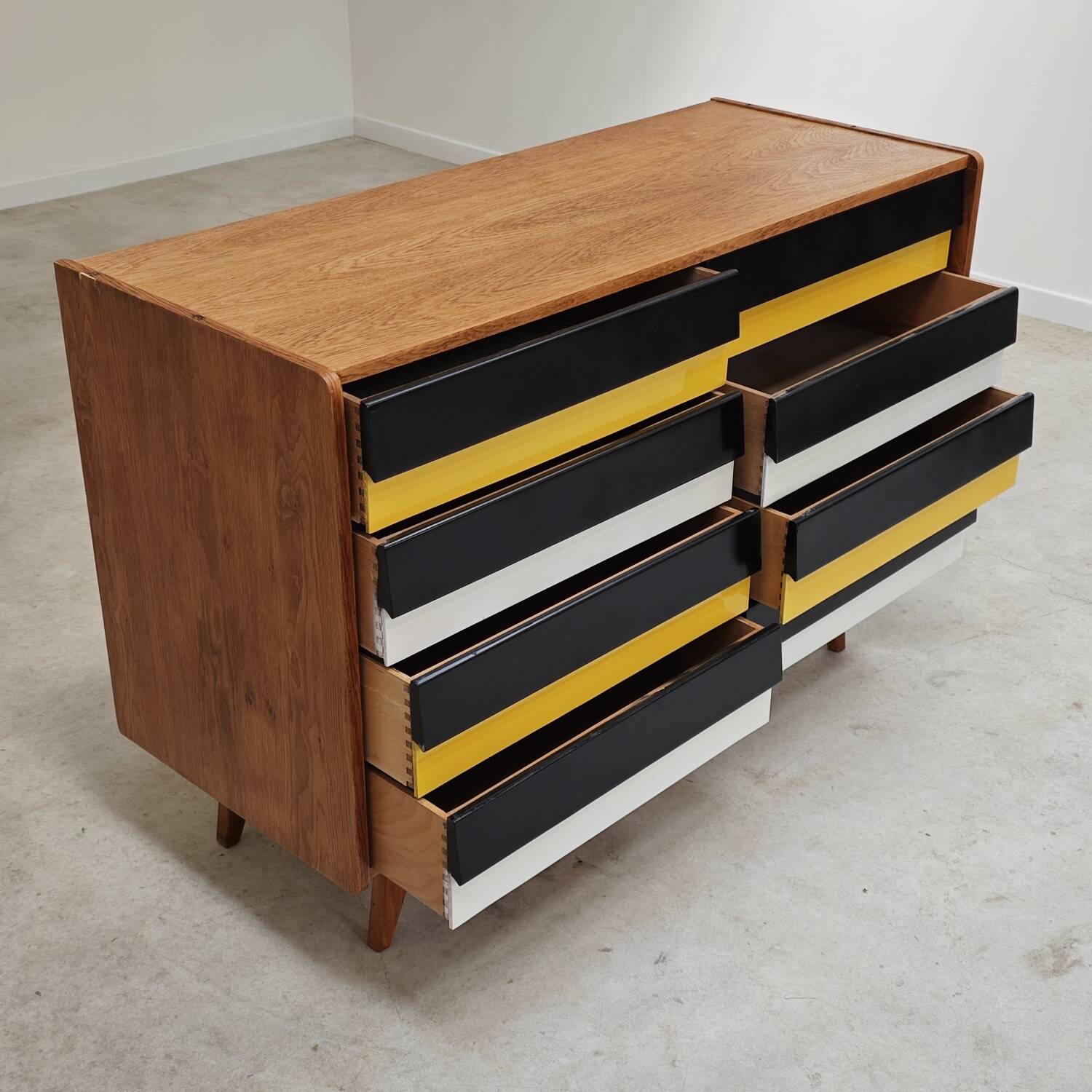 U453 yellow 8-drawer wooden sideboard by Jiri Jiroutek for Interier Praha 1960