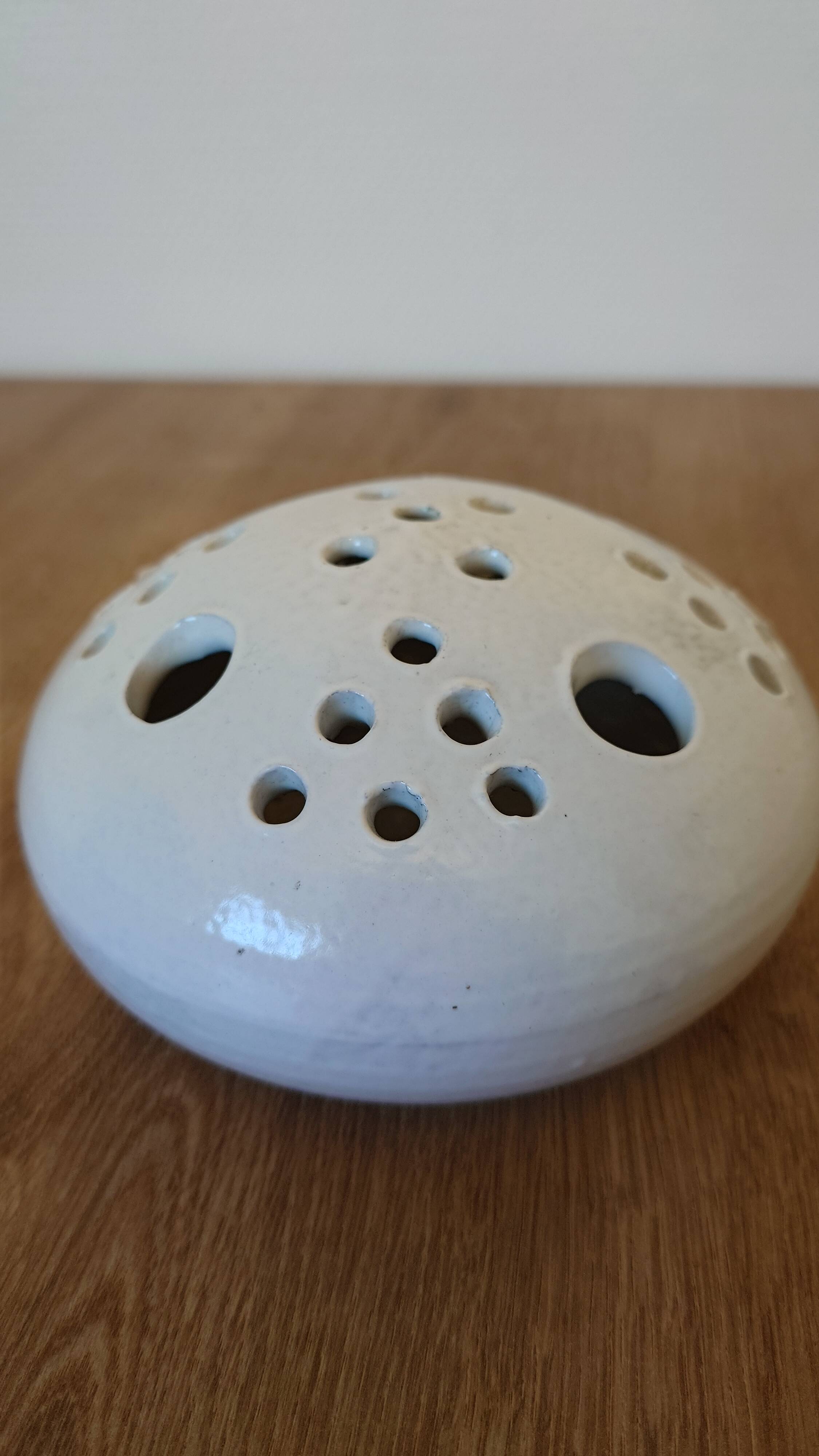 Centrepiece, white ceramic flower holder signed.