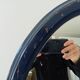 Vintage oval mirror in petrol blue wood