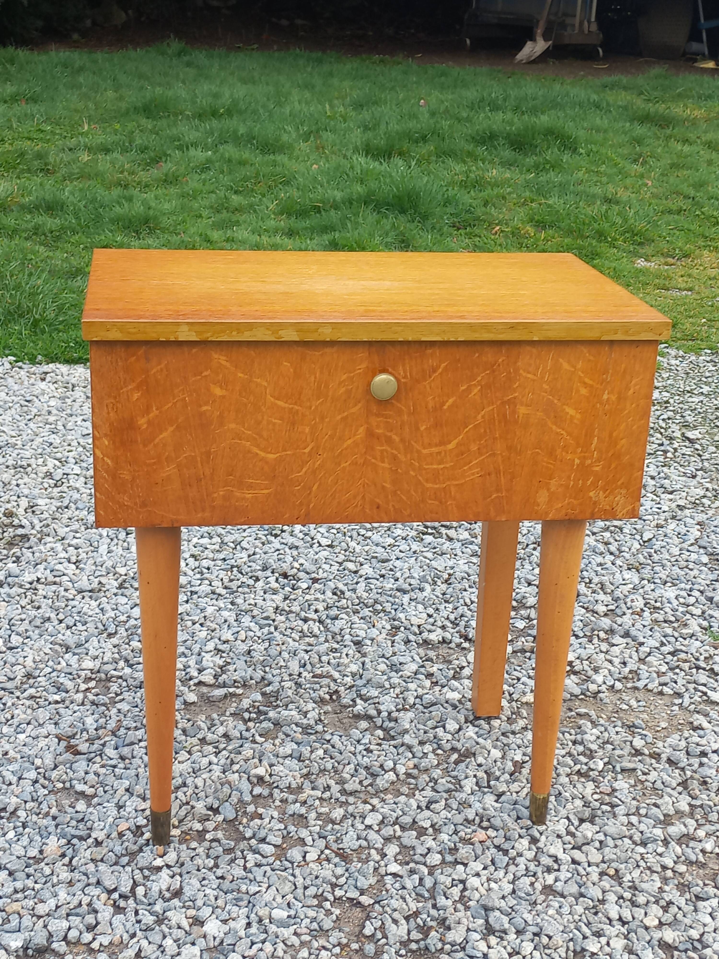 Vintage 1950s bedside table in blond oak with conical legs