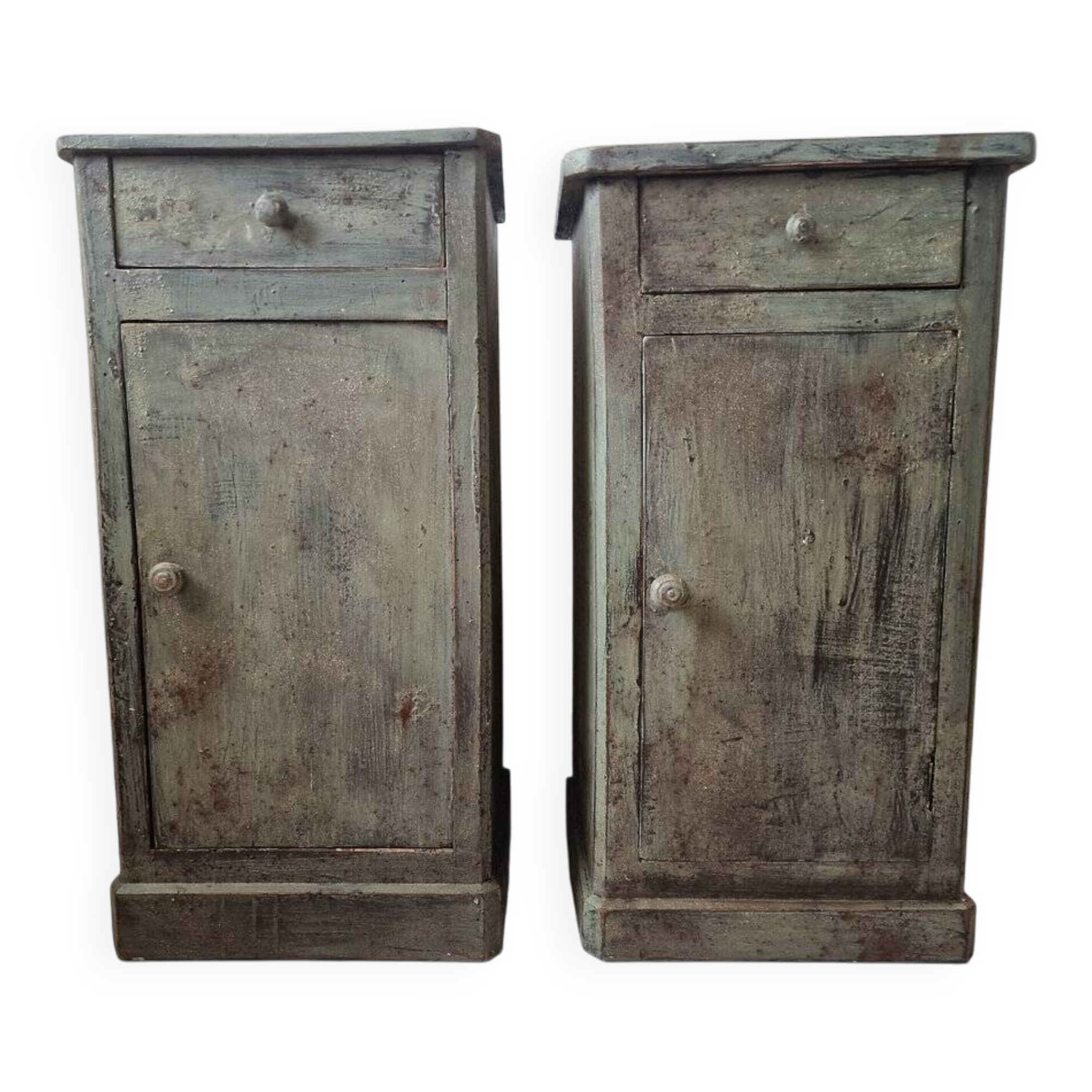 Pair of antique bedside tables with a green patina