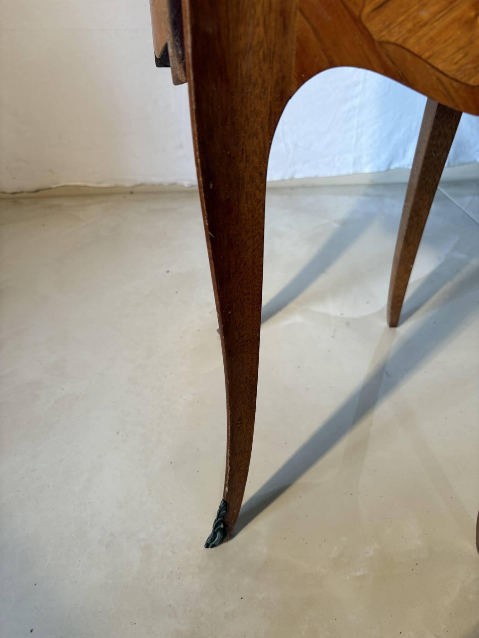 Small curved Louis XV style piece of furniture – marquetry and marble top