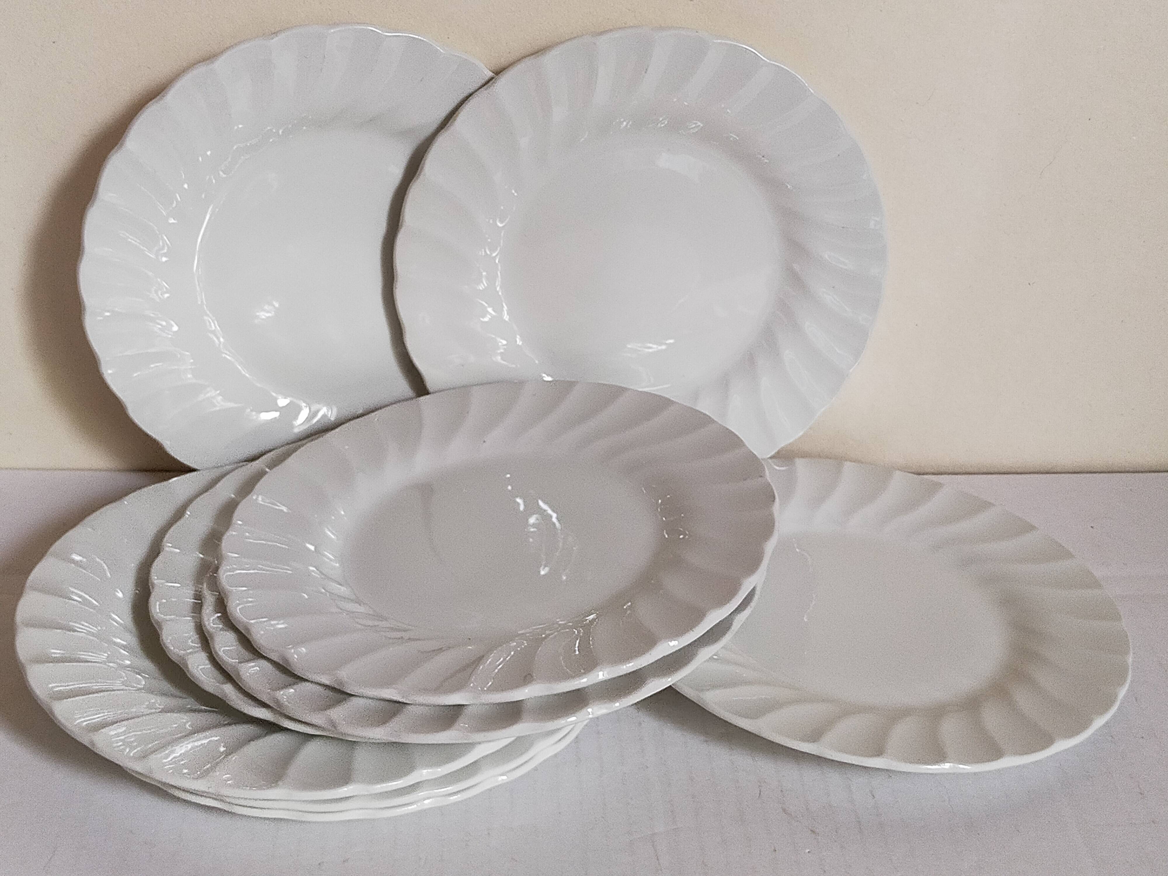 Nine fine English porcelain sweet plates