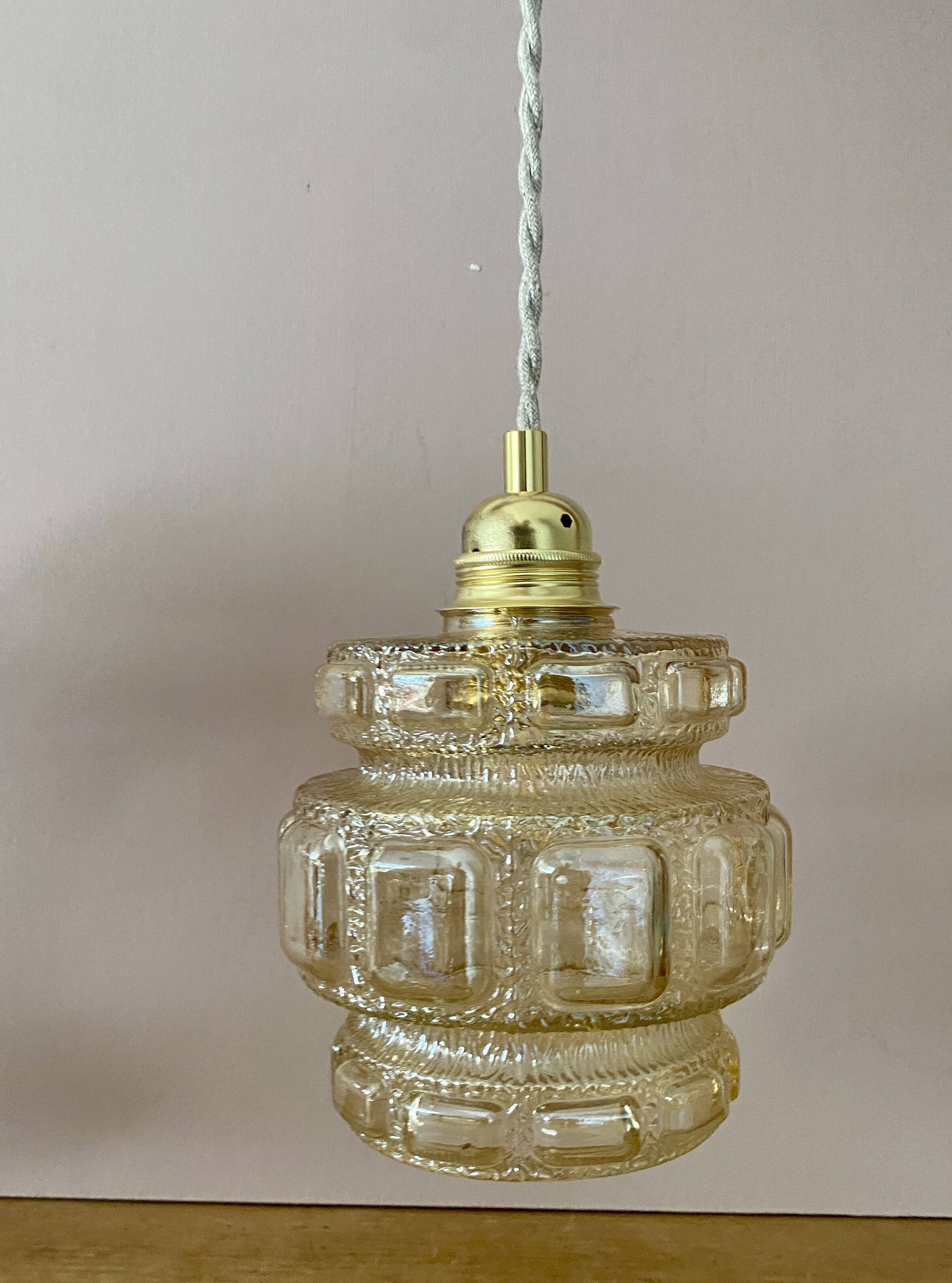 Vintage globe pendant light in amber glass