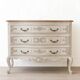 Louis XV curved bow commode style