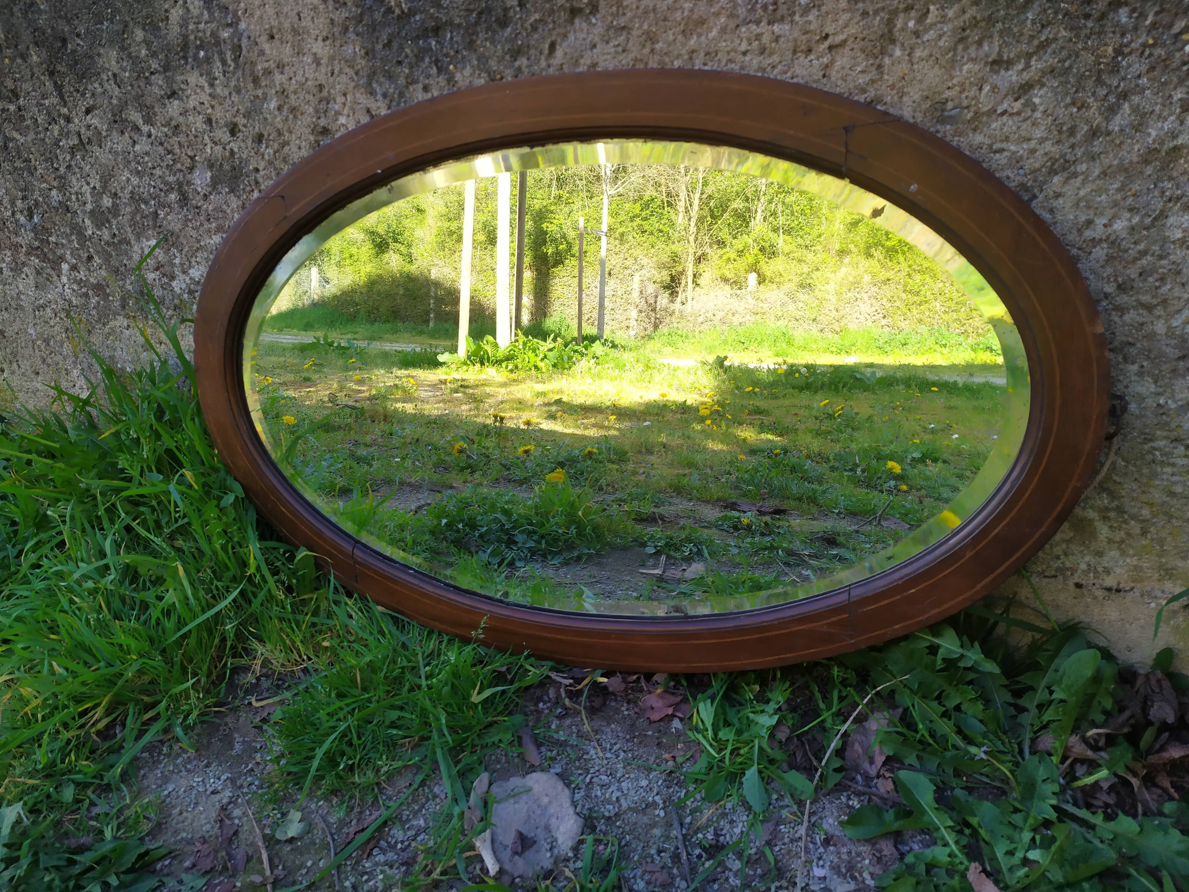 Beveled oval mirror 83x52cm