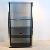 Armoire en verre fumé et laiton