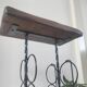 Side table, brutalist bottle holder in wrought iron and solid wood.