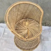 Vintage woven rattan/basket barrel chair
