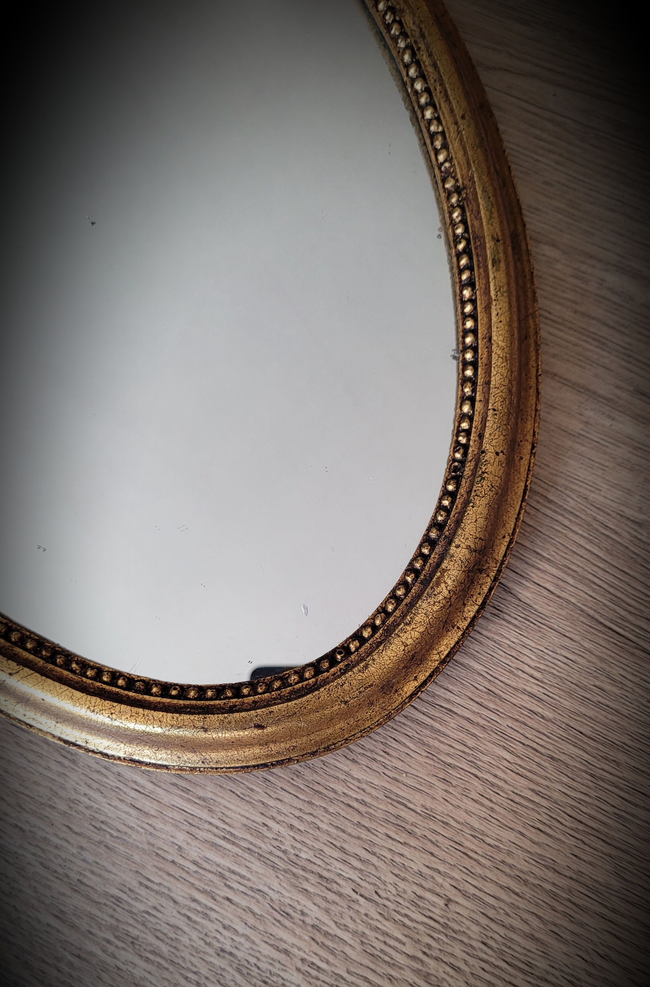 Oval golden mirror 41x23
