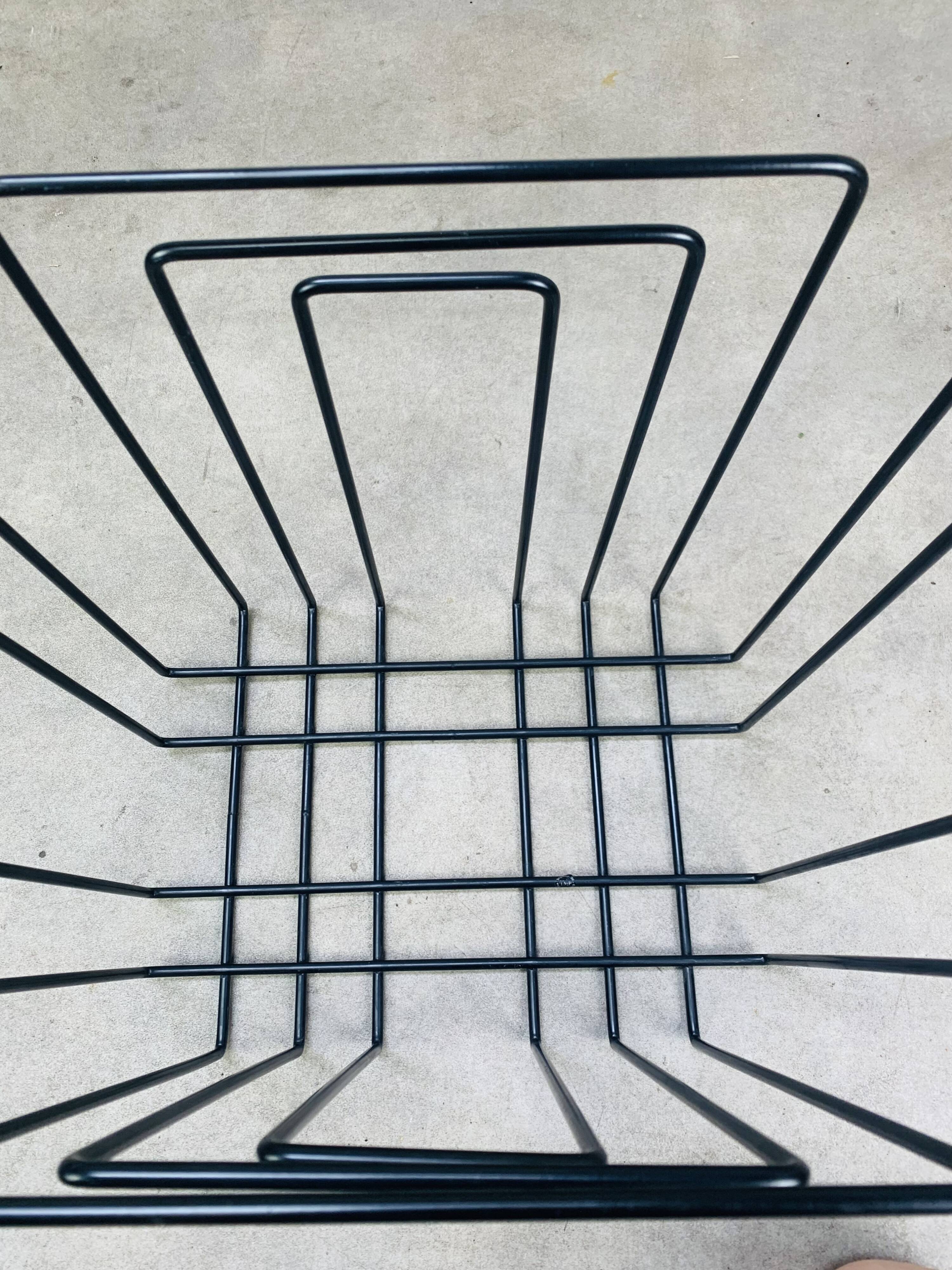 Black metal magazine rack by Willy Glaeser for TMP, 1980s.