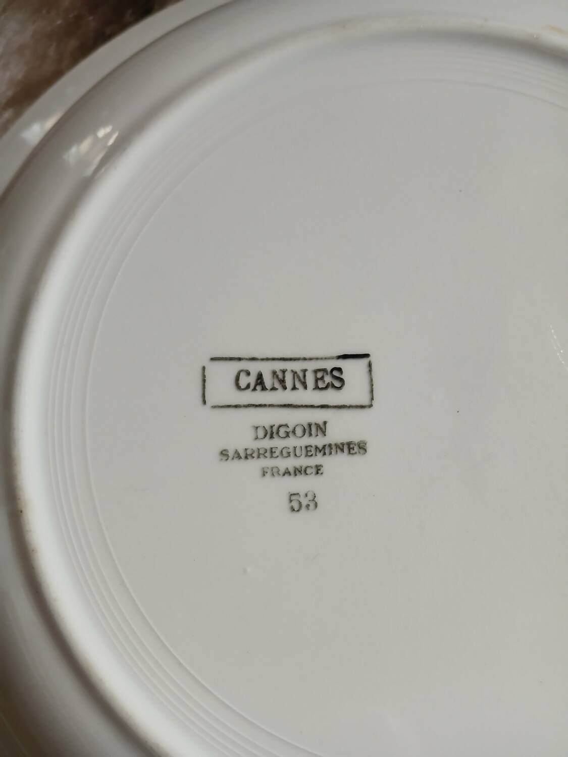 Large round antique plate from Digoin and Sarreguemines.