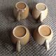 Series of 4 sandstone cups