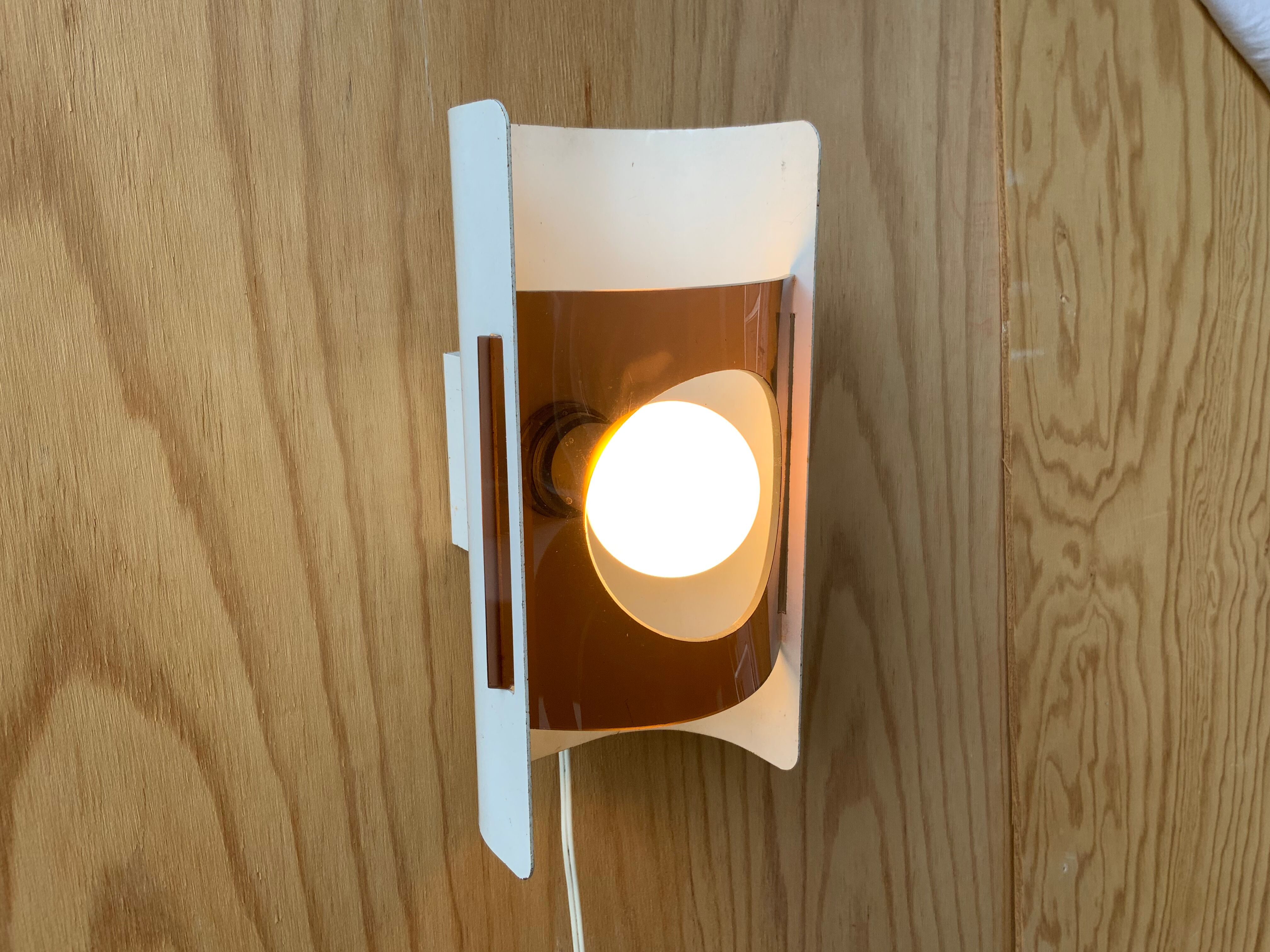 Plexiglas and metal wall lamp