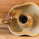 Signed sandstone candle holder