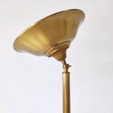 Halogen floor lamp in golden brass