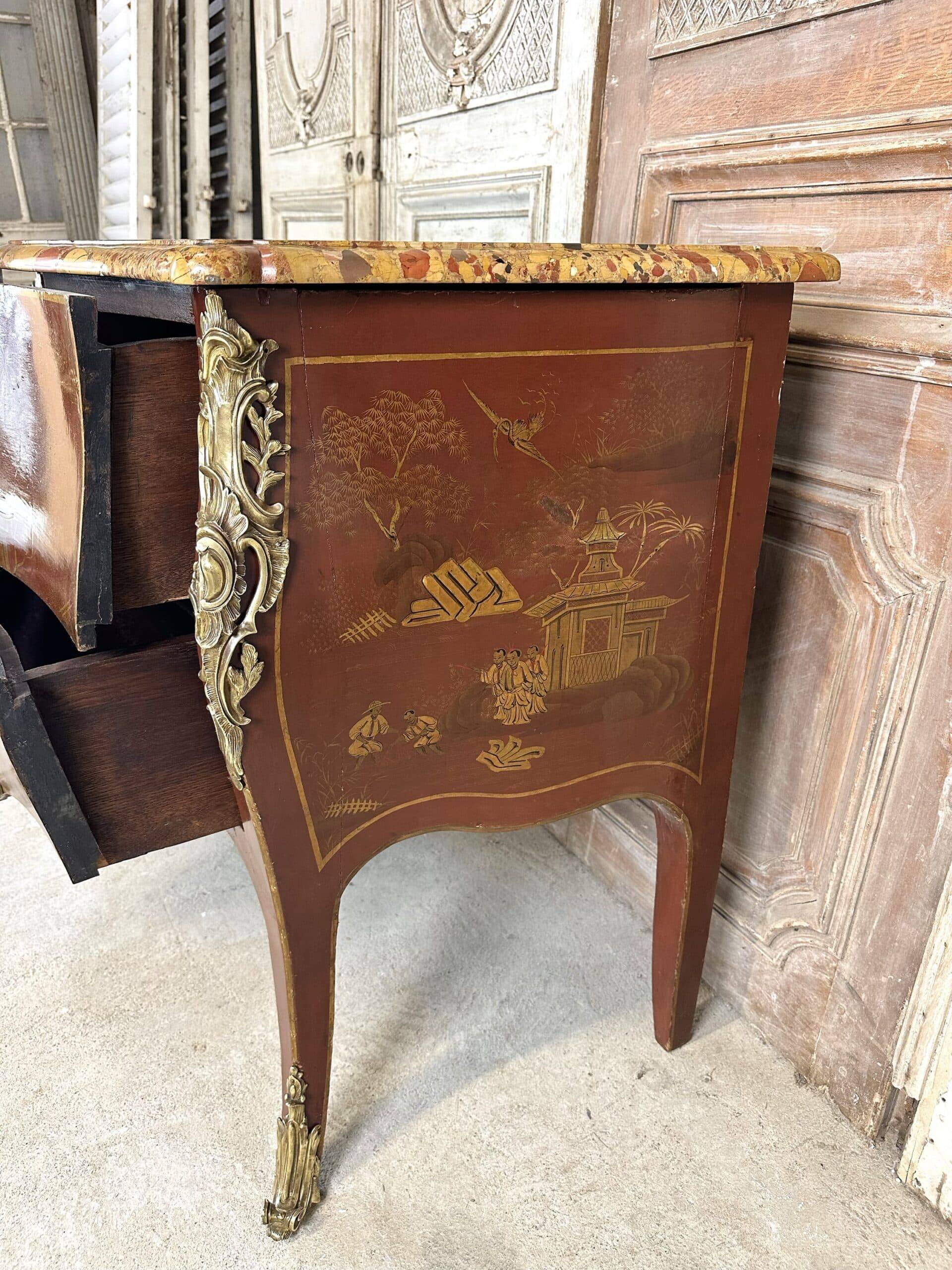 Louis XV style commode in red lacquer from the 1900s.