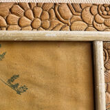 Bouquet of flowers in carved art deco frame