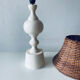 Large turned white wooden lamp