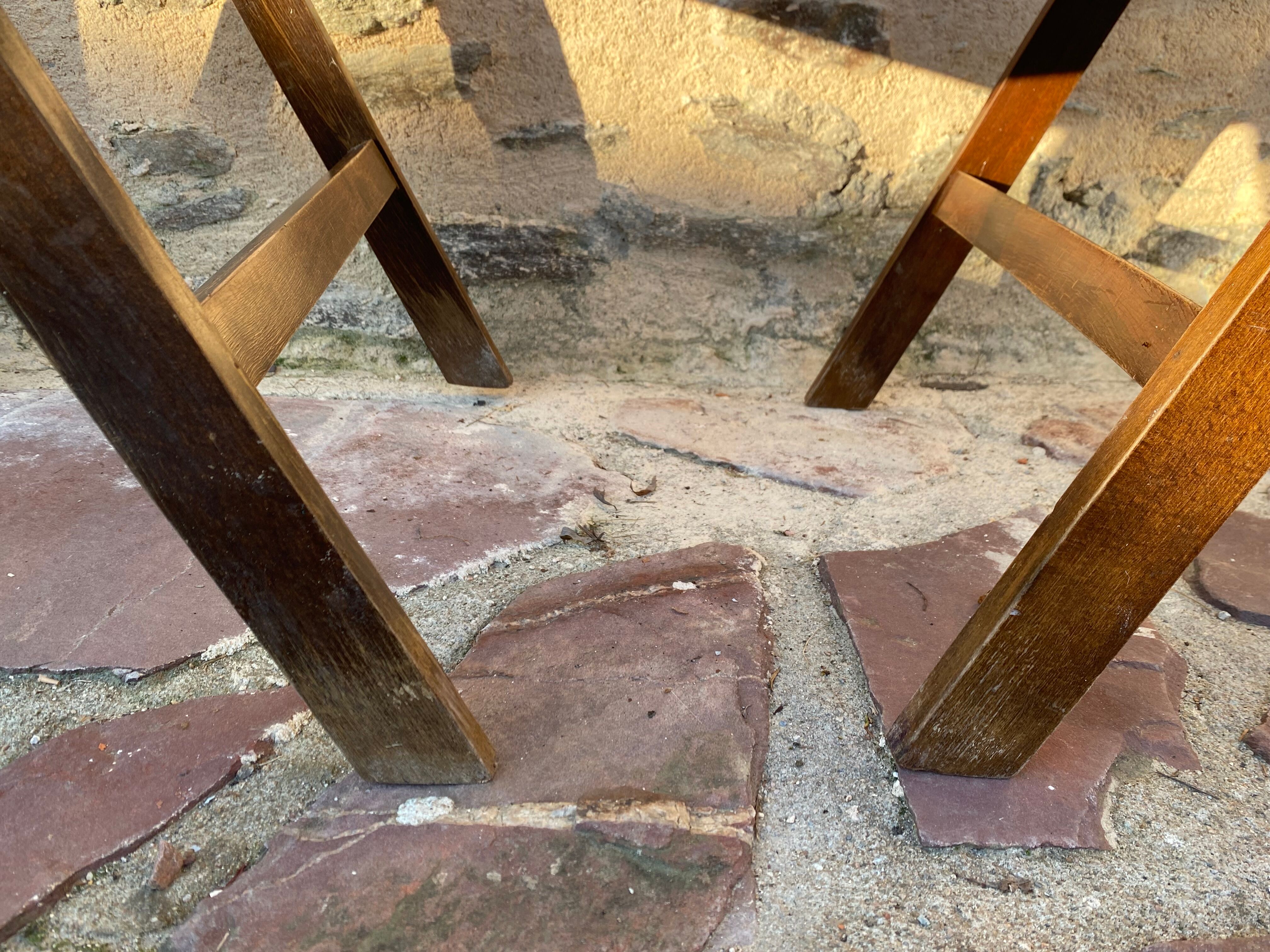 Three wooden folding chairs