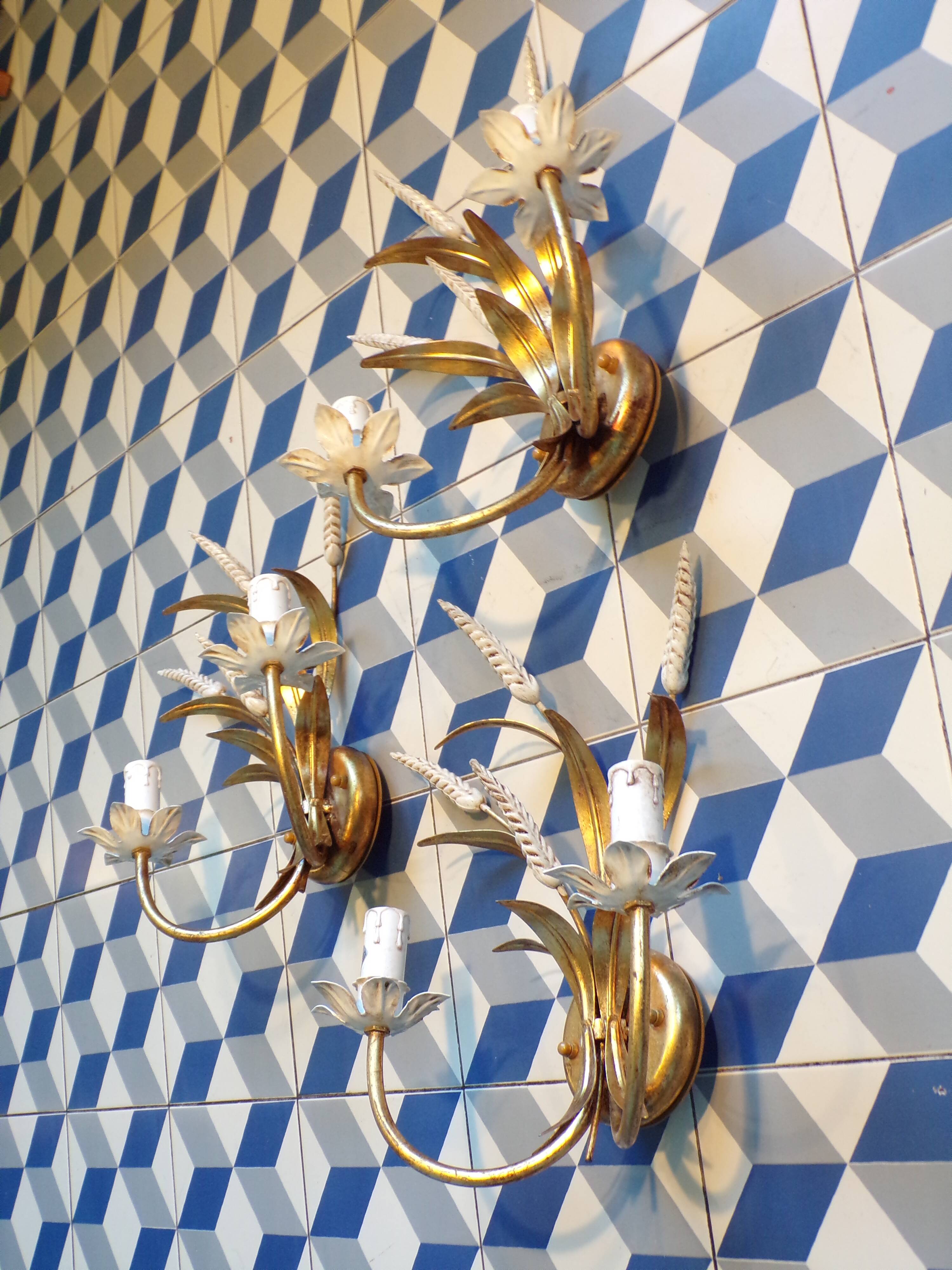 Trio of golden iron wheat ear wall lights