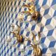 Trio of golden iron wheat ear wall lights