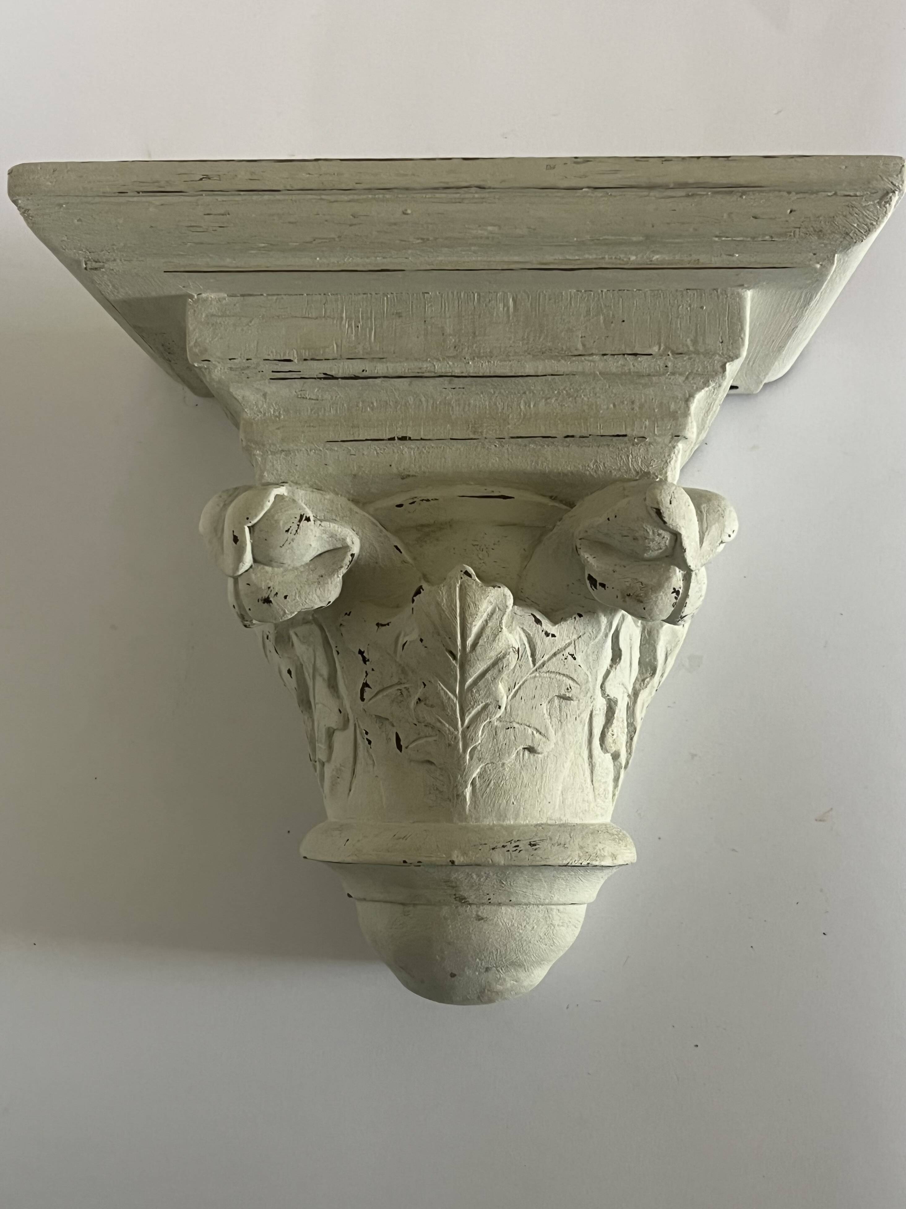 Carved wooden wall bracket