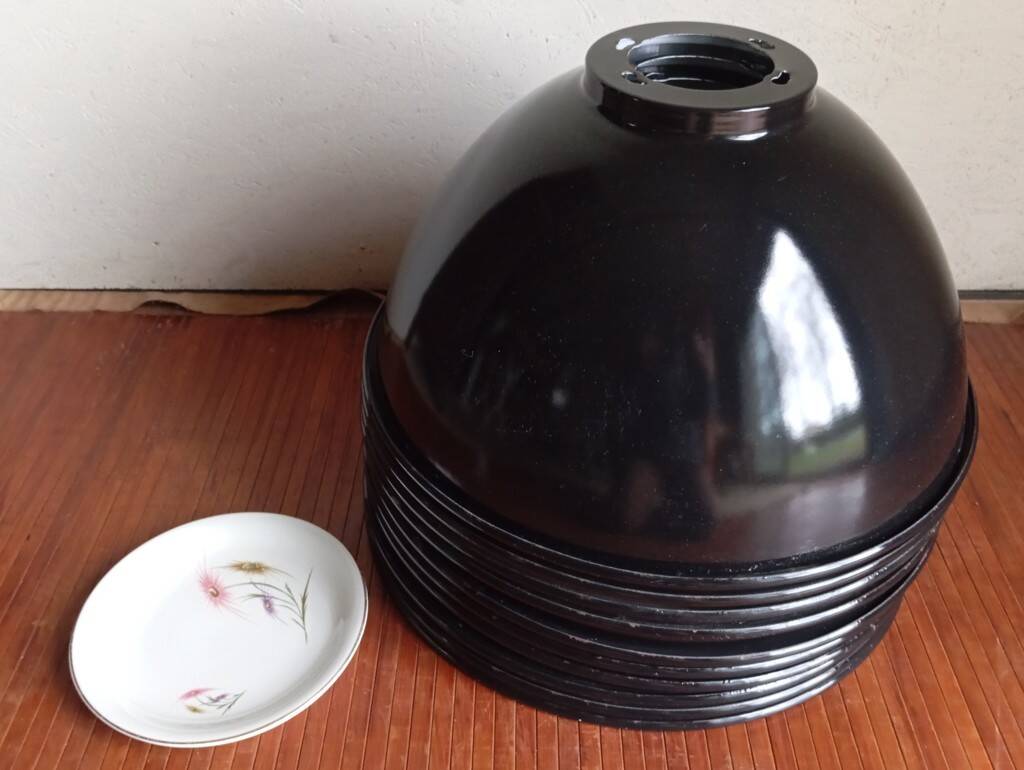 Set of 10 large industrial enamelled metal pendants.