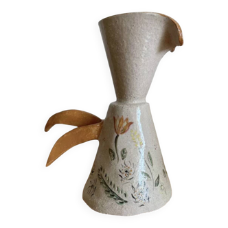 Handcrafted pitcher with floral motif