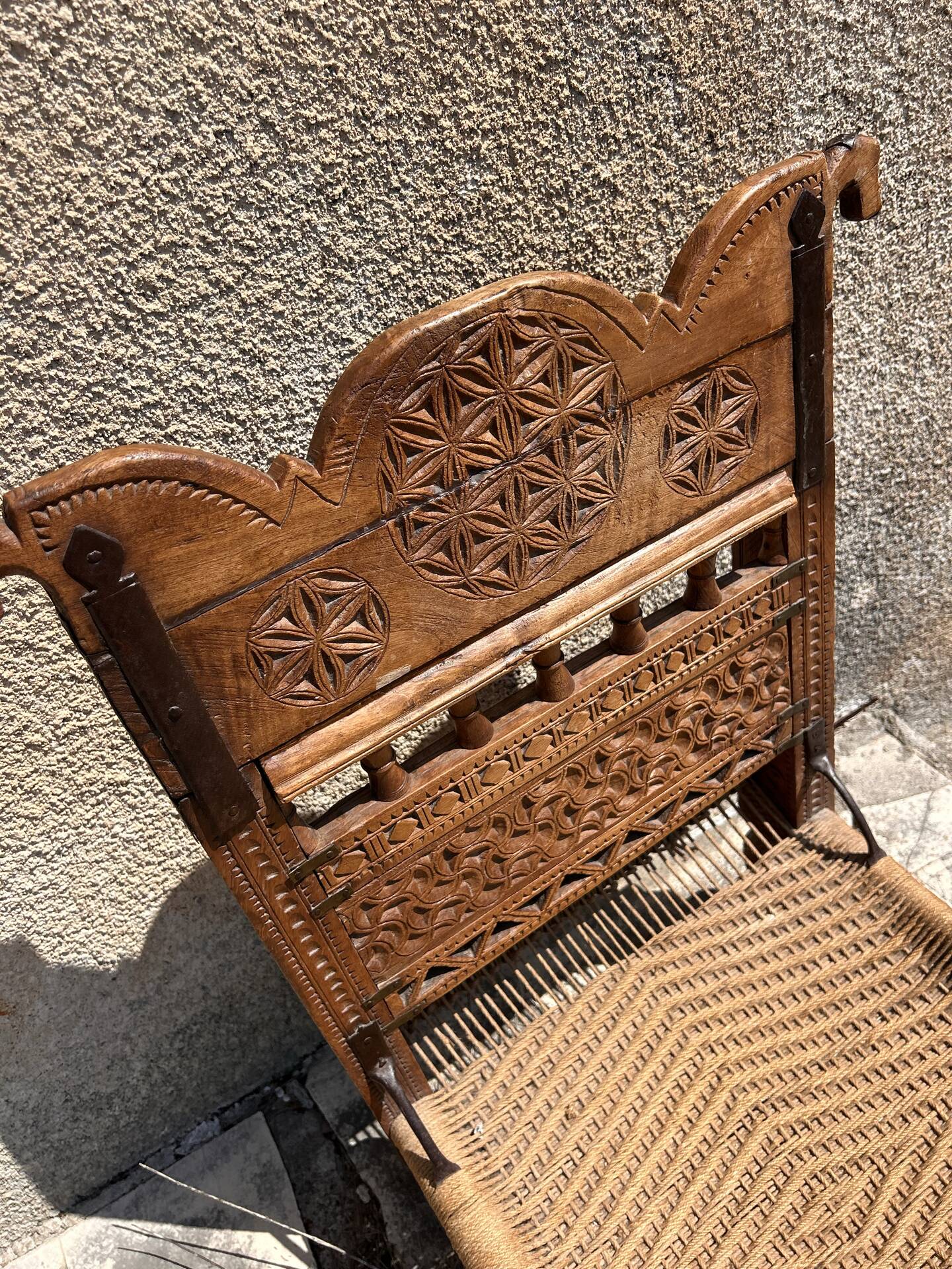 Antique ethnic chair in carved wood