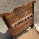 Antique ethnic chair in carved wood
