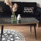 Coffee table, year 60, black with floral patterns