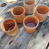 Set of 5 stoneware mugs.