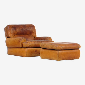 Vintage lounge arm chair with ottoman in cognac leather