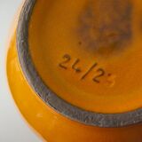 Orange vase with handle