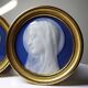 Pair of religious medallions in Limoges porcelain, circa 1900-1930.