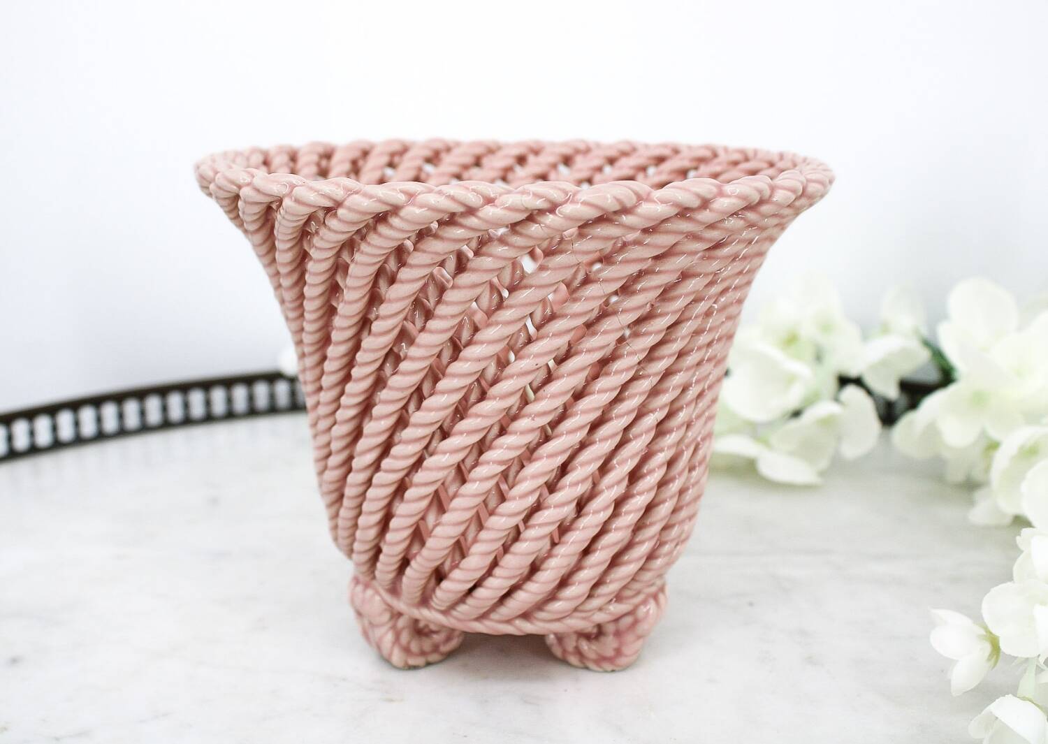 Small vintage handmade plant pot in pink woven ceramic