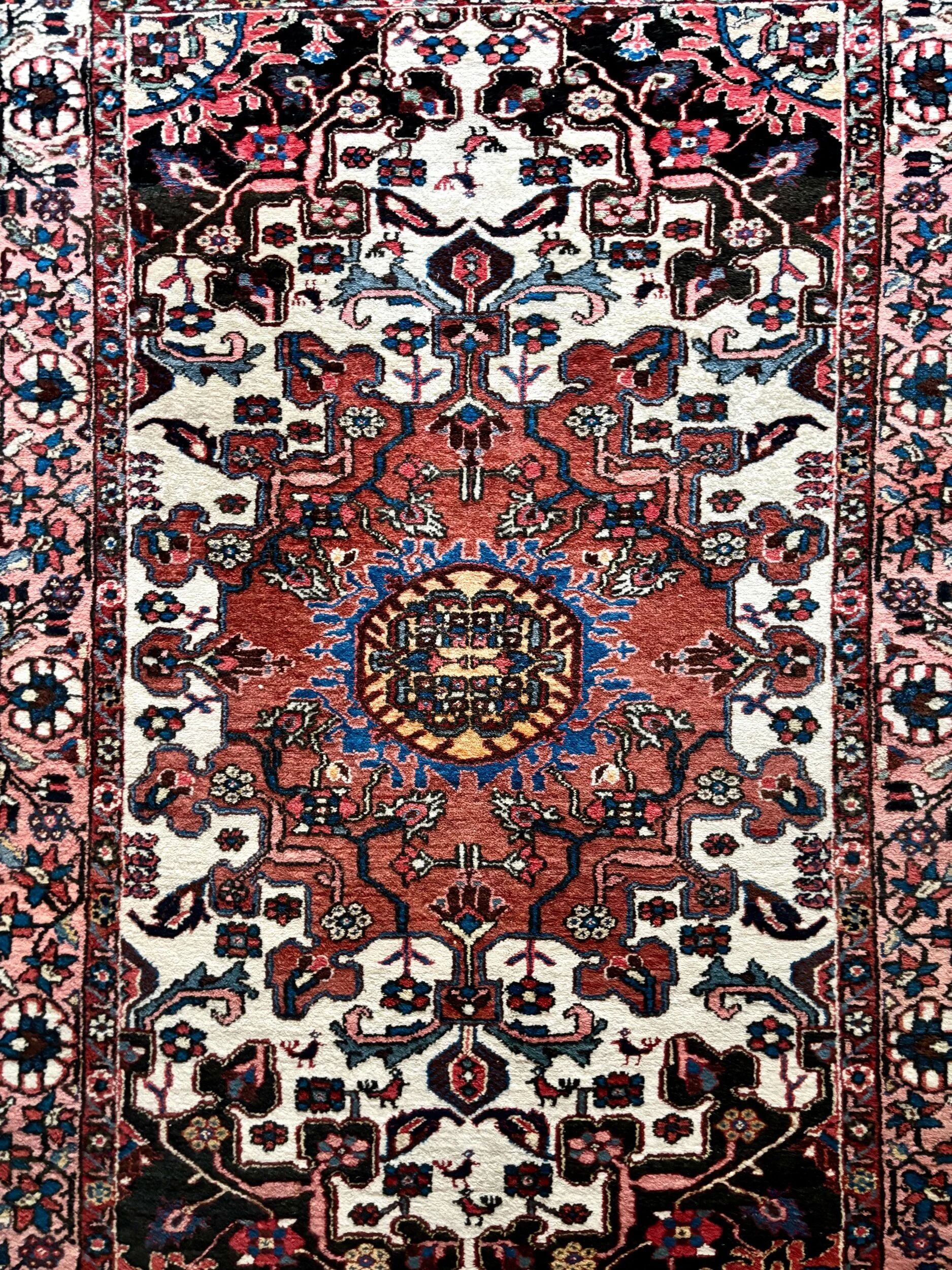 Persian carpet in wool and silk, old rose.