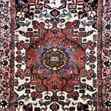 Persian carpet in wool and silk, old rose.