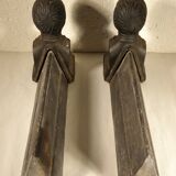 Old cast iron chenets