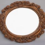 Miroir ovale doré et sculpté en bois. Miroir vintage. Miroir mural.