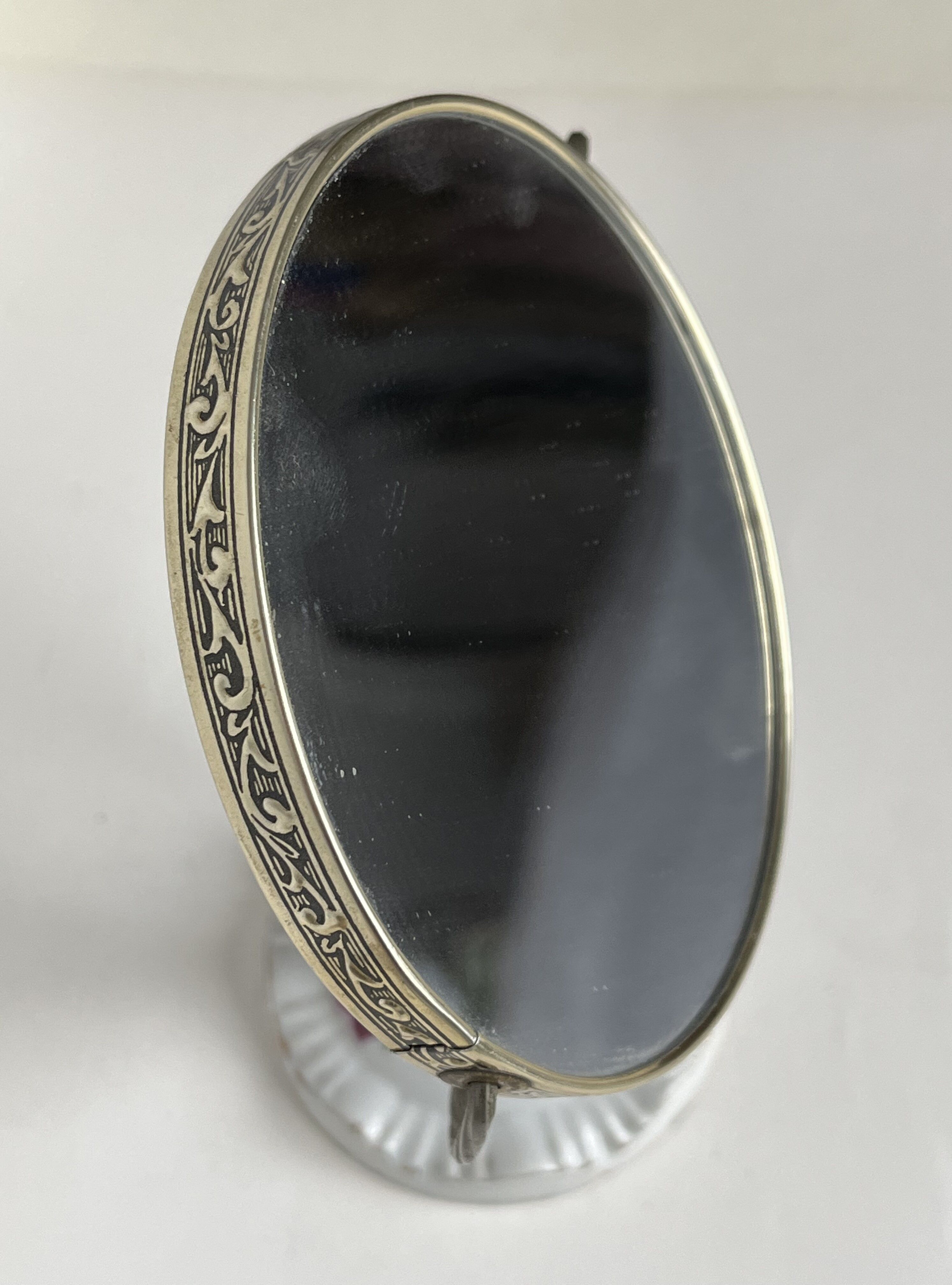 Swivel double-sided toilet mirror