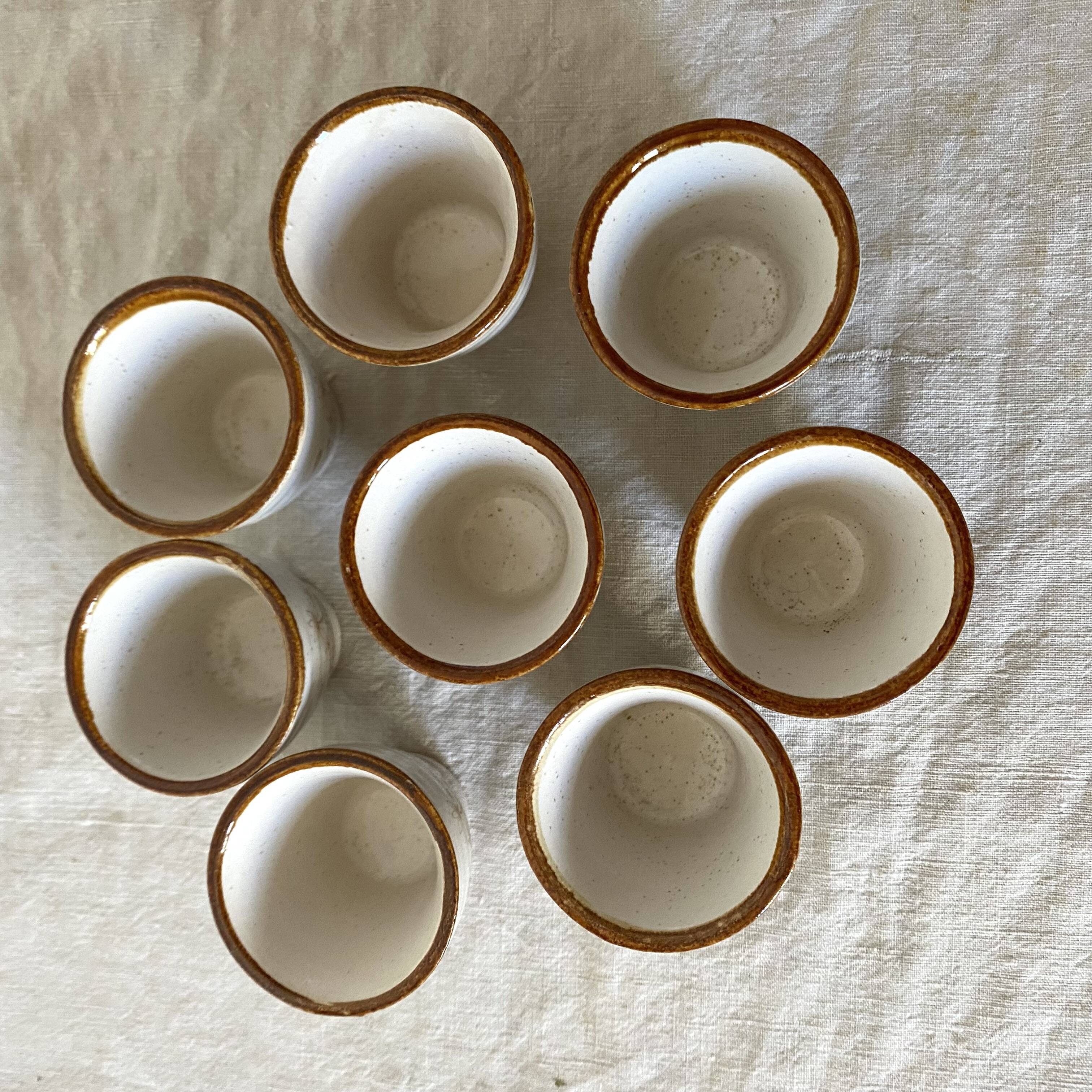 Stoneware egg cups, floral decoration