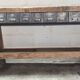 Old carpenter's workbench with eight metal drawers, industrial console