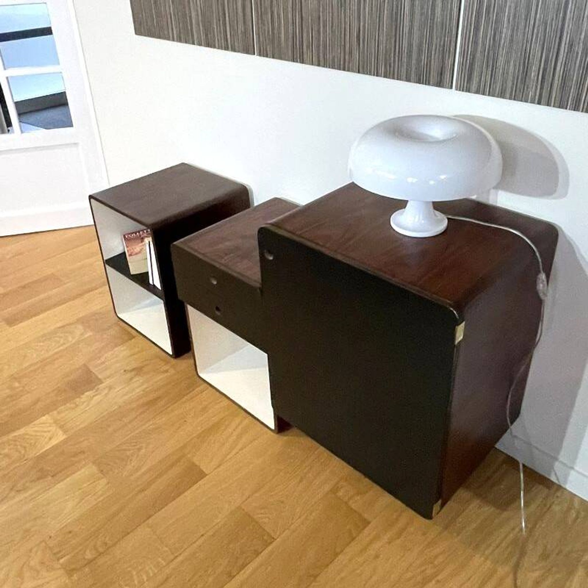 Vintage 1970s Space Age bedside tables in wood and black.