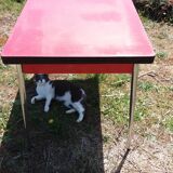 Dining table with red formica extensions