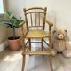 Antique bamboo caned baby chair from the early 20th century.