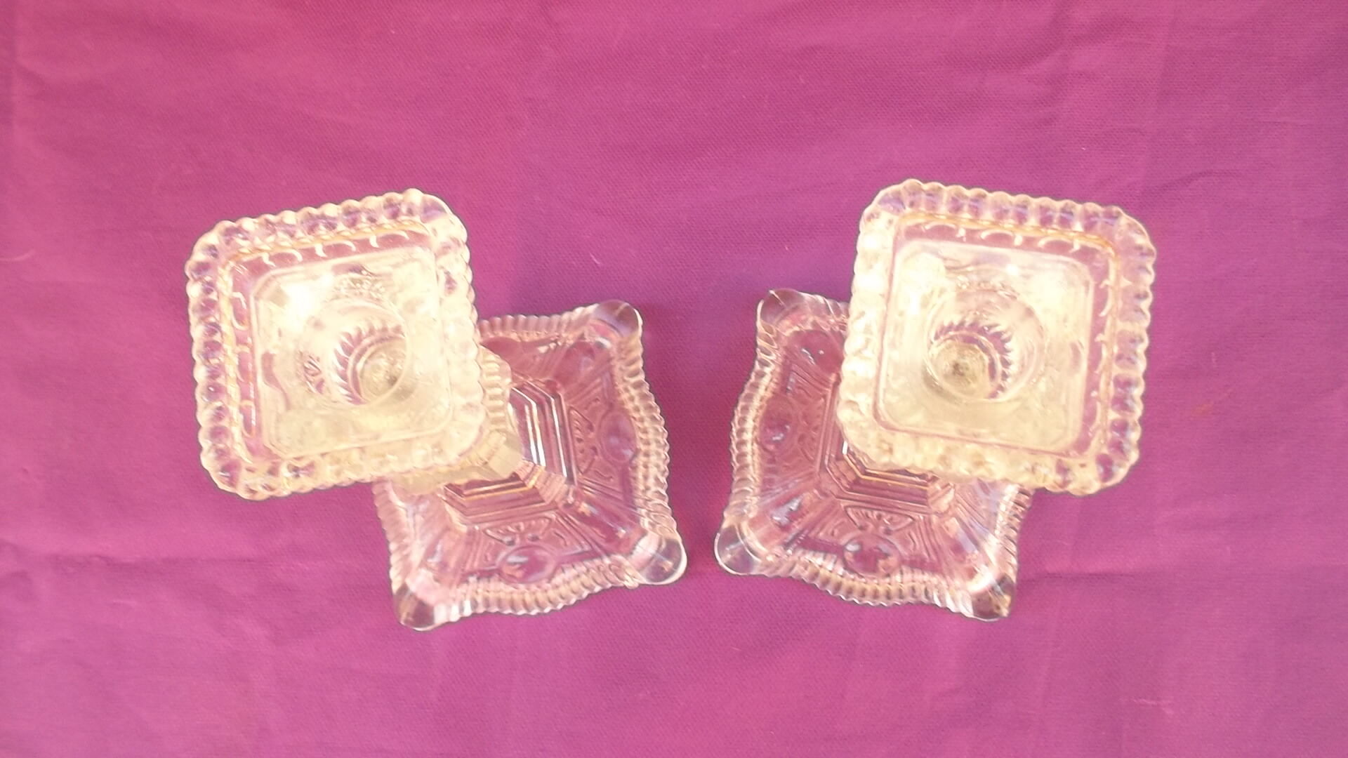 Pair of glass candle holders